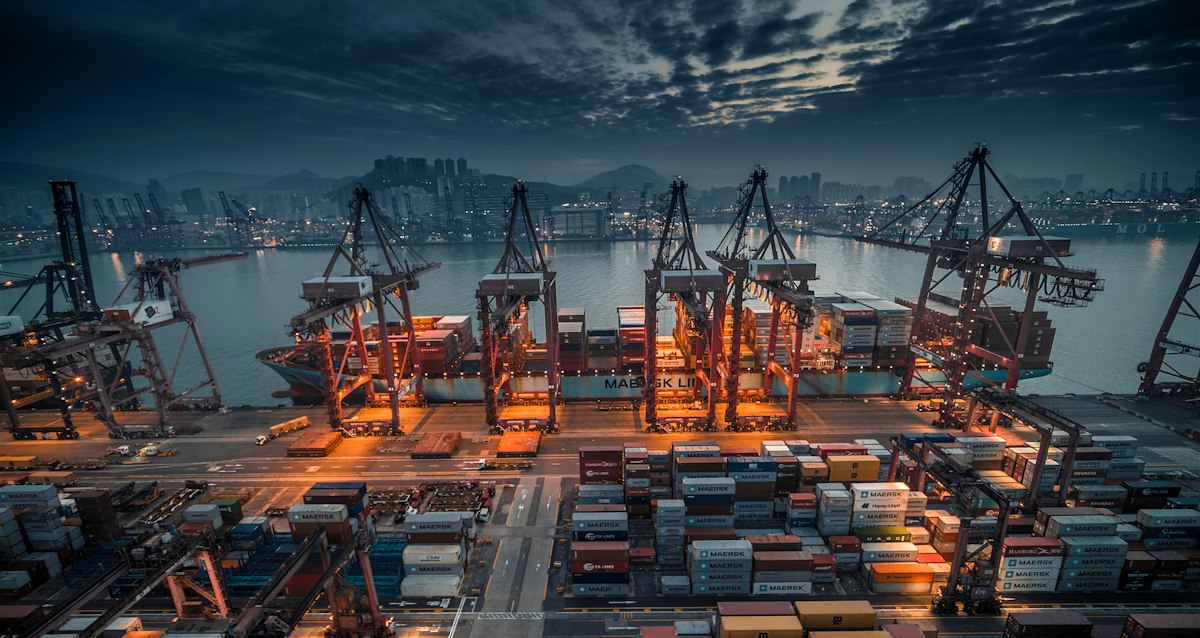 Shipping containers and port cranes for intermodal freight