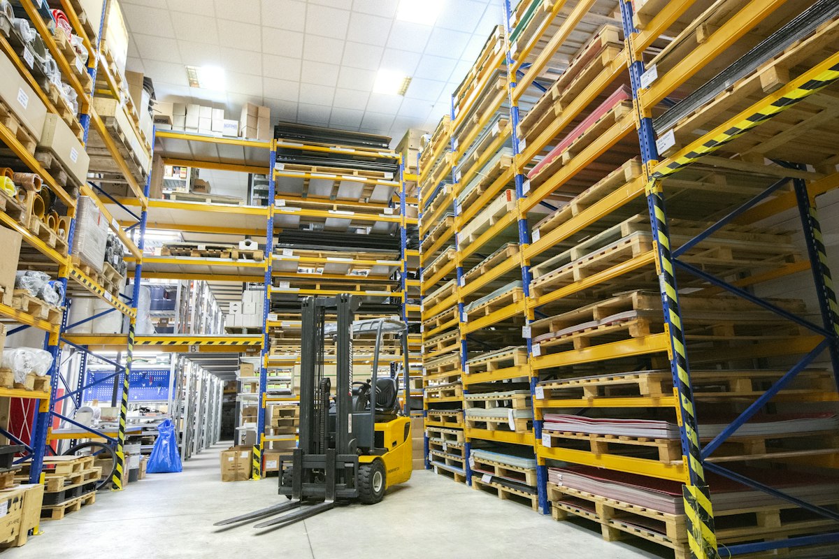 Warehouse forklift loading palletized freight